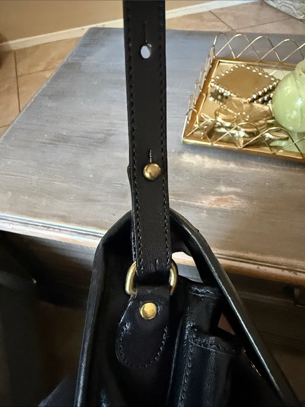 Brahmin Black Leather Messenger Bag with Gold Medallion